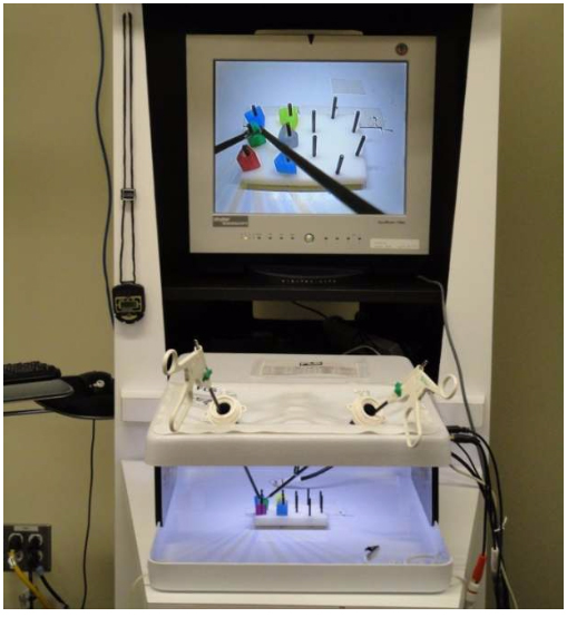 The mechanical training toolbox exhibits the peg-transfer task. (RPI)