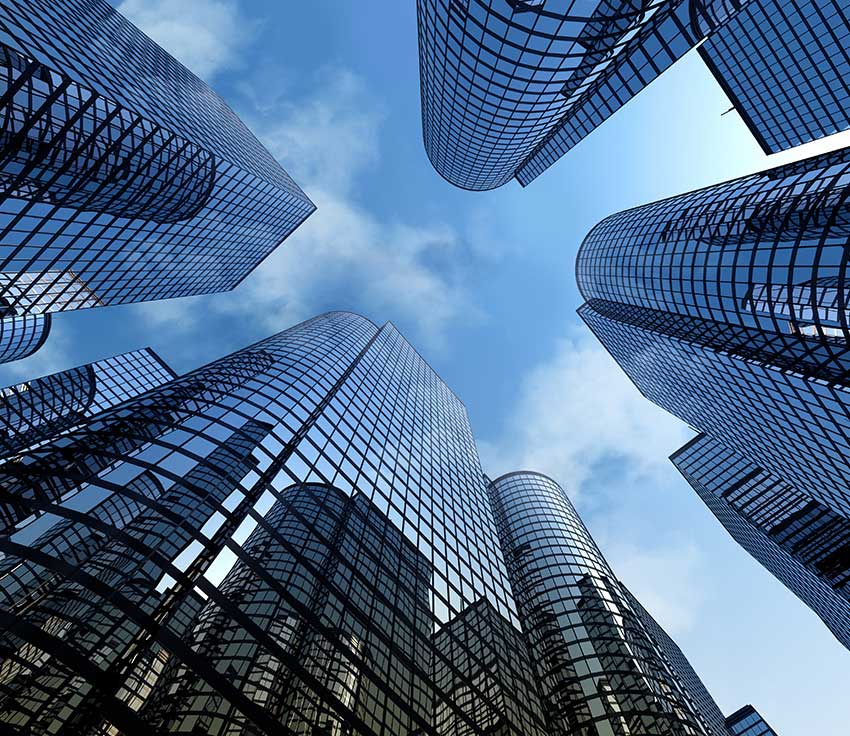 looking up at city buildings