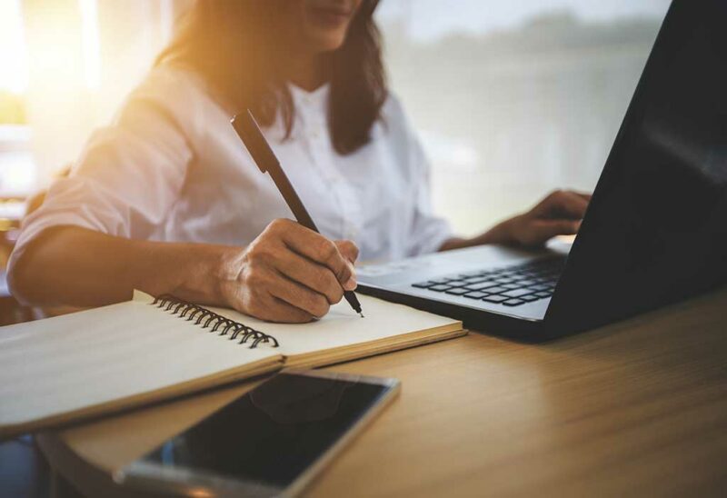Women taking notes