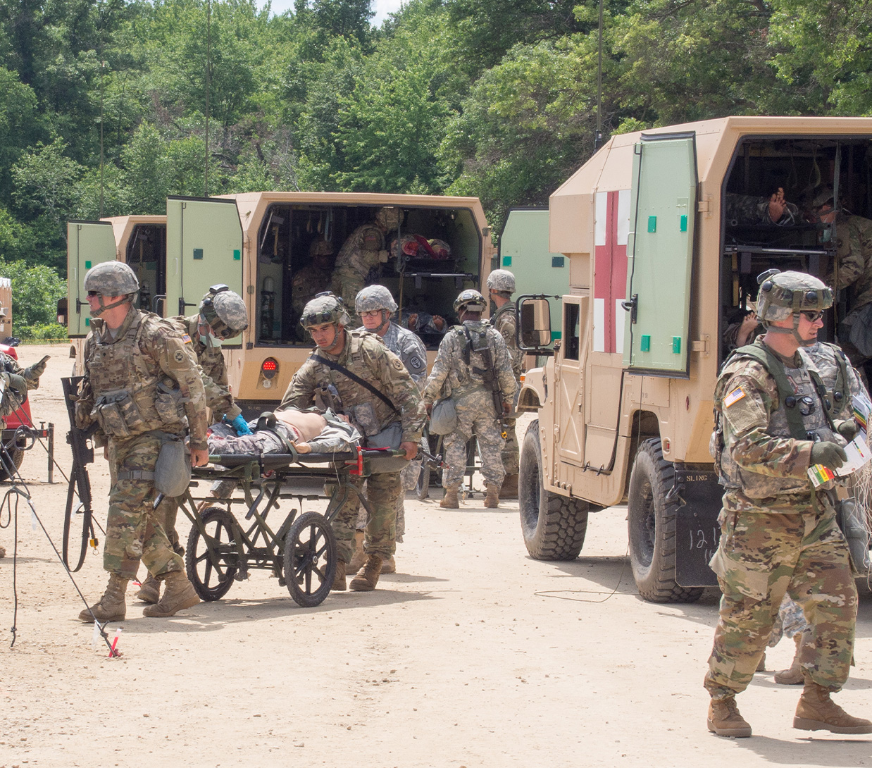 Soldiers provide medical care in war zone