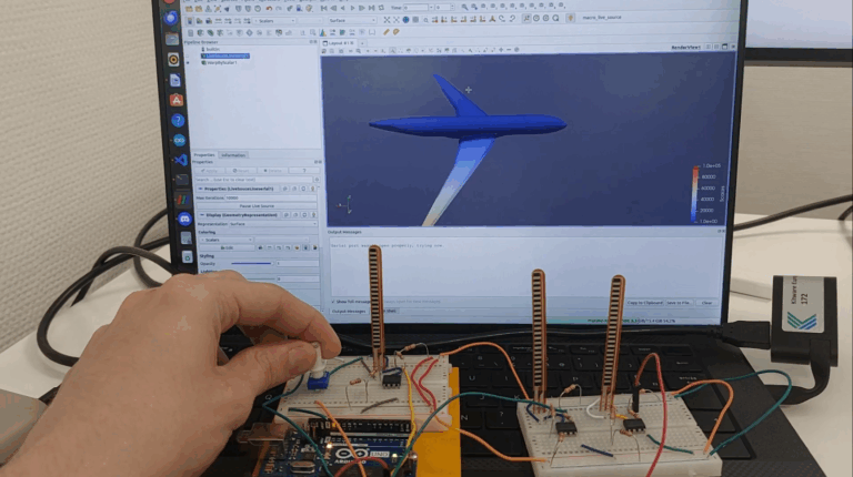 Hand adjusting robotic levers and screen behind displaying a plane