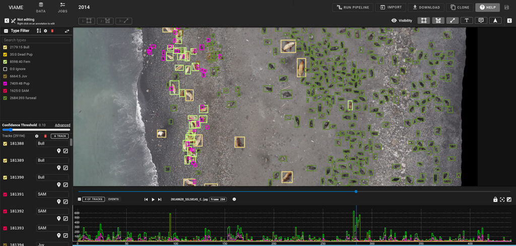 DIVE annotating overhead video of a shoreline with detections and tracks following sea lions, in one of NOAA’s population monitoring studies. By combining DIVE with the VIAME open source model library, researchers can automatically identify species and track movement patterns that inform ecological conservation and habitat protection.