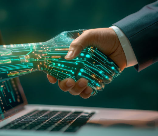 Computer graphic of a human shaking a computer's hand.